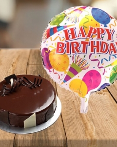Cake with happy birthday balloon